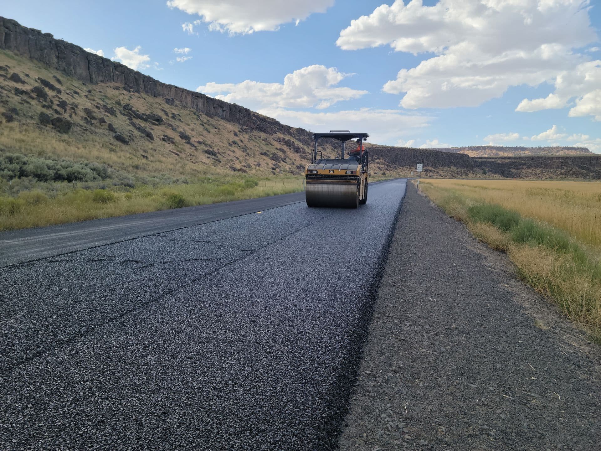 Roller compacting asphalt